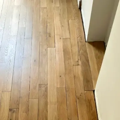 Raccord de parquet d'une cheminée